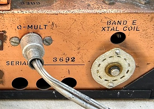 Close-up of a Drake 2-B rear apron stamped SERIAL 3692, between the Q-MULT socket and the BAND E crystal coil